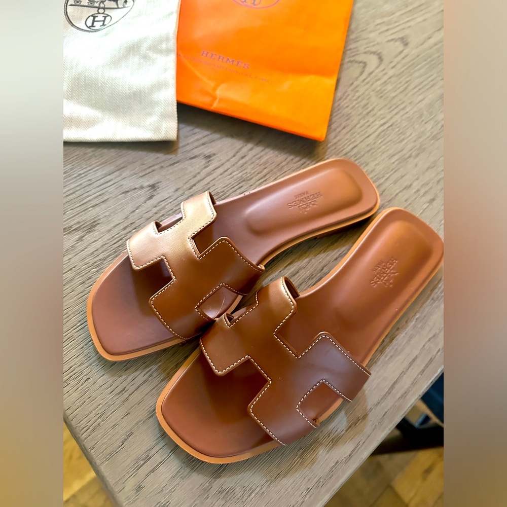 classic tan hermes oran sandals
